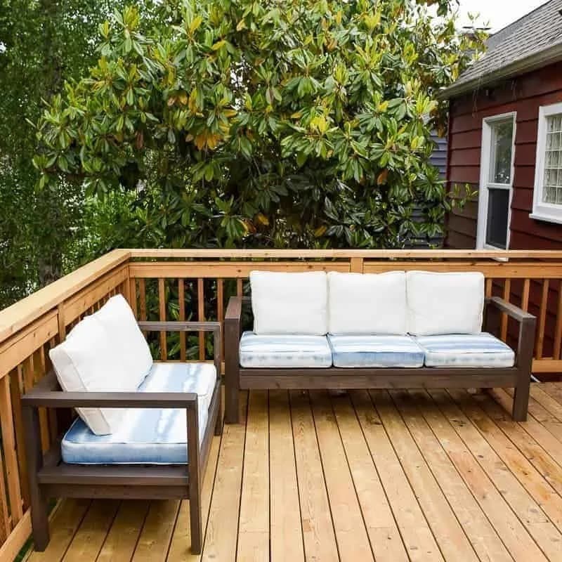 outdoor sofa and loveseat on deck