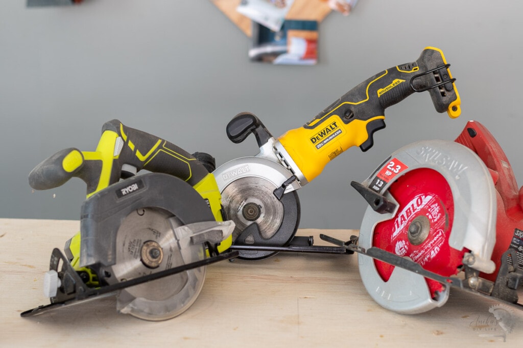 three types of circular saws on a workbench
