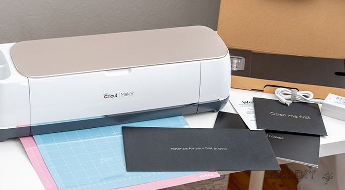 Cricut Maker on desk with everything included in the box