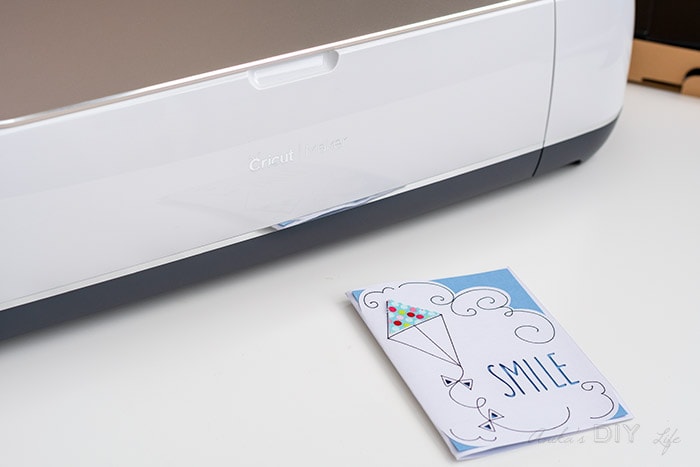 Simple Smile card in front of Cricut Maker machine