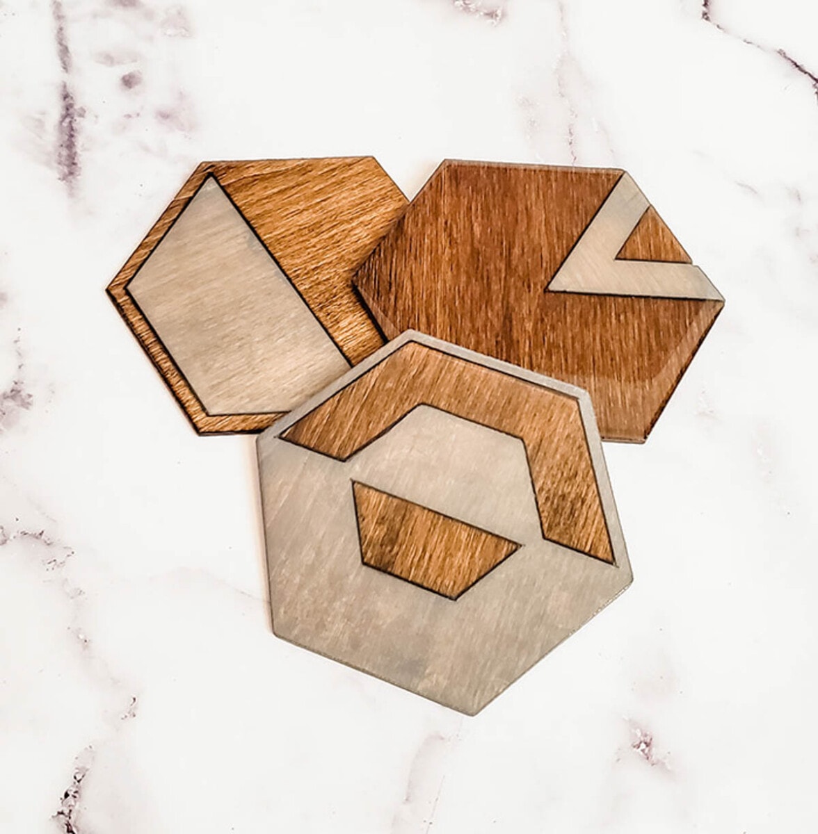 Wooden geometric coasters made with Cricut