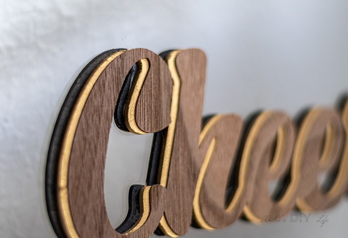 close up of Cheers sign with layers 