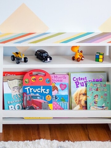 This DIY Kids bedside table combines function and style. This kids furniture has book storage for easy access to bedtime reading. Add organization to the kids' room with this easy beginner woodworking project!