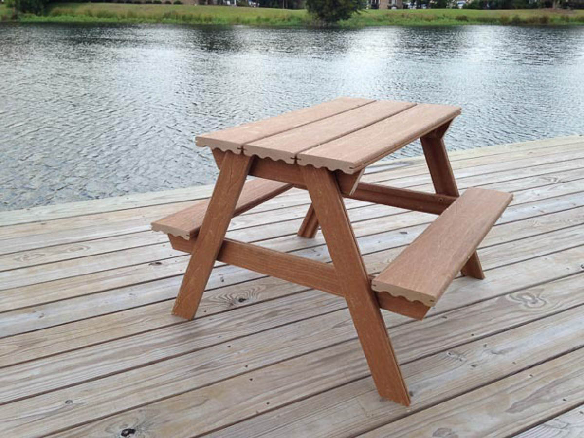 DIY picnic table for kids using composite decking for the top and benches