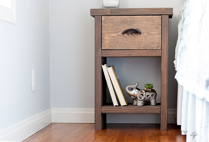 DIY nightstand with drawer and hidden compartment next to bed