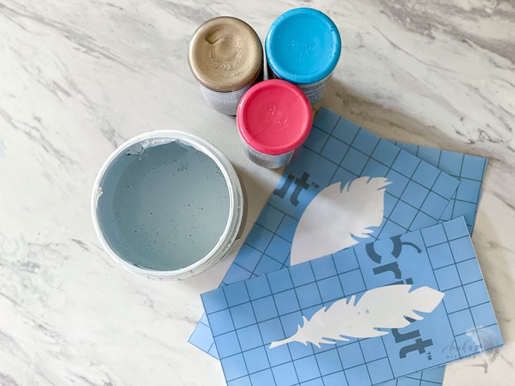 coral, blue and gold color pallet for stenciled wall using Cricut maker