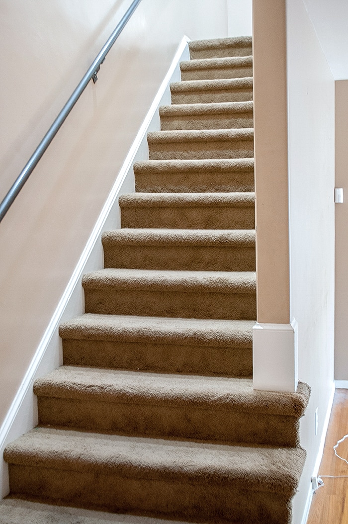 DIY staircase makeover from carpet to wood! Get ready to blow your mind!