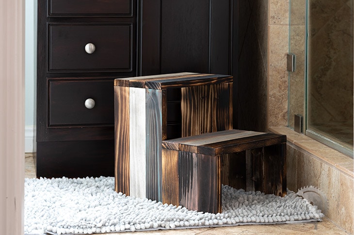 DIY wooden step stool in bathroom
