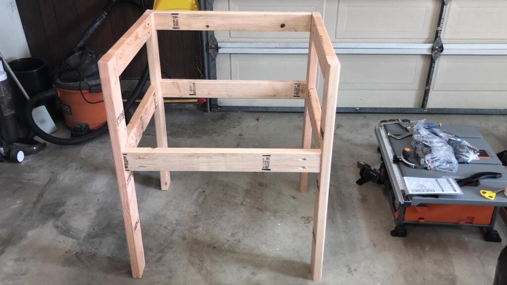 Frame for the table saw stand with folding outfeed table