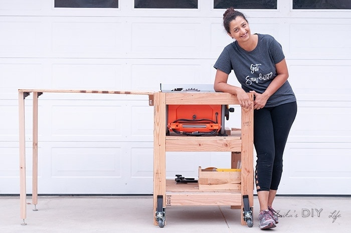 Woman standing with DIY Table saw stand