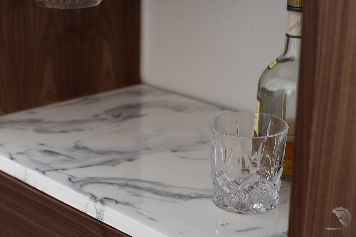 Close up of the marble counter in the bar cabinet