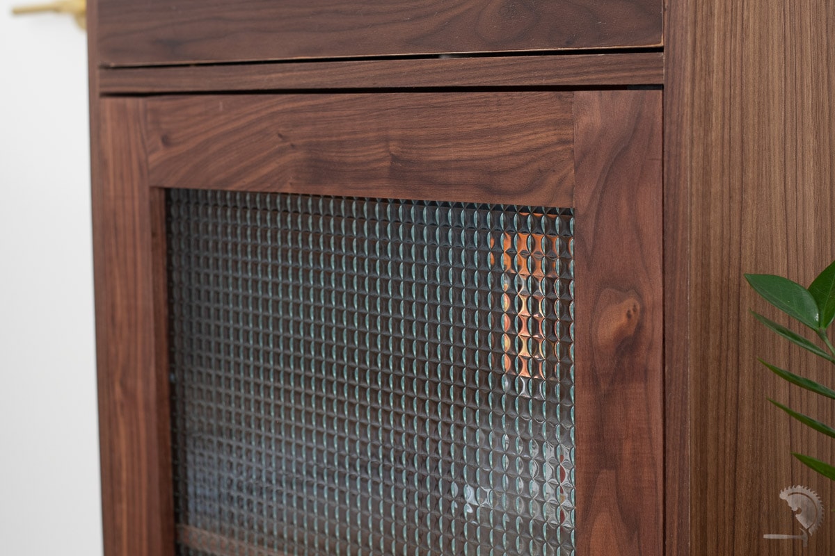 Close up of the DIY glass door in the cabinet