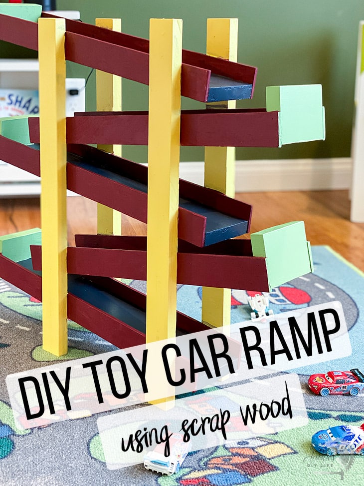 DIY toy car ramp in kids room with text overlay