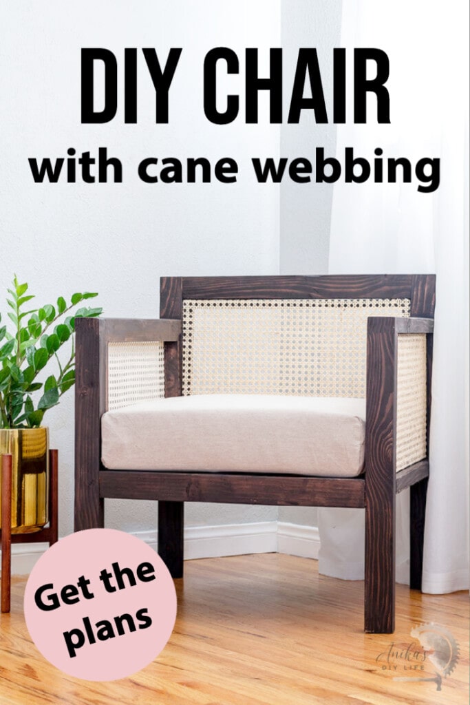 Brown chair with cane webbing in arm and back in room with colorful pillow and plant next to it with text overlay