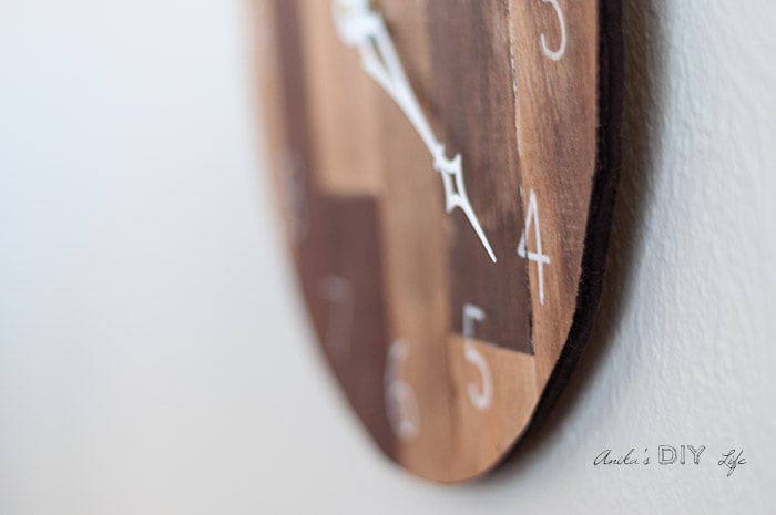 close up DIY wood clock on the wall