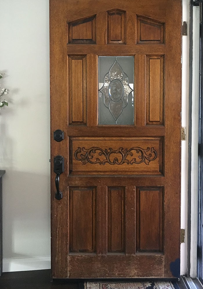old brown door before front door makeover