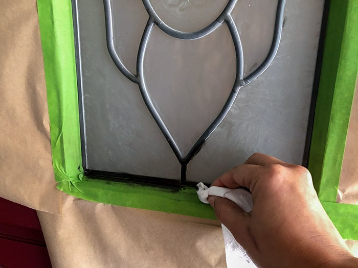 Updating the glass insert of an old wooden door for a full makeover