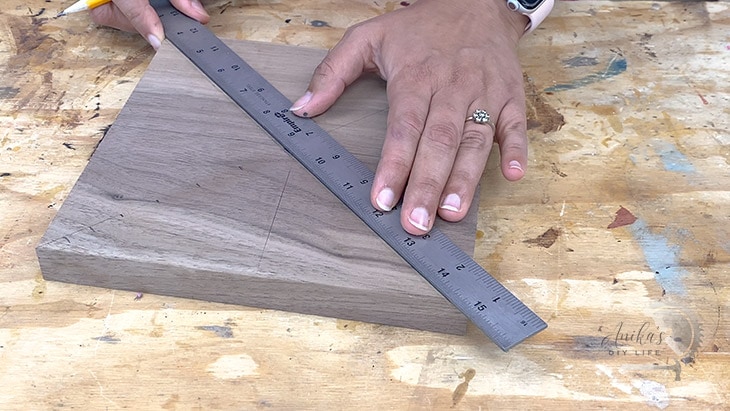 marking locations of metal inlay on the wood clock