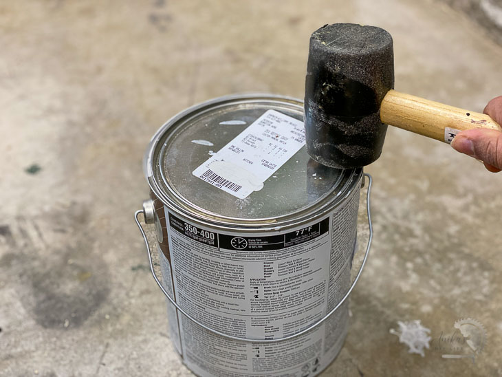 tapping the paint can with a mallet instead of a hammer