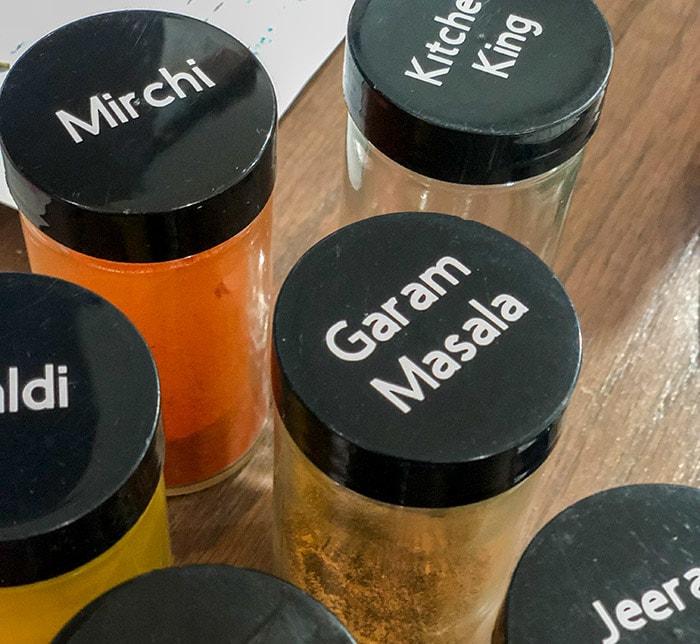 labeled indian spice jars