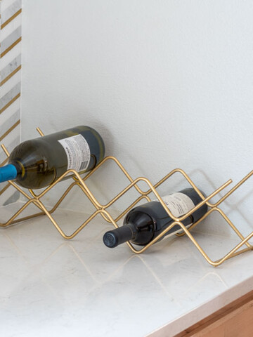 Learn how to make a tabletop DIY wine rack using steel rods - no welding needed!
