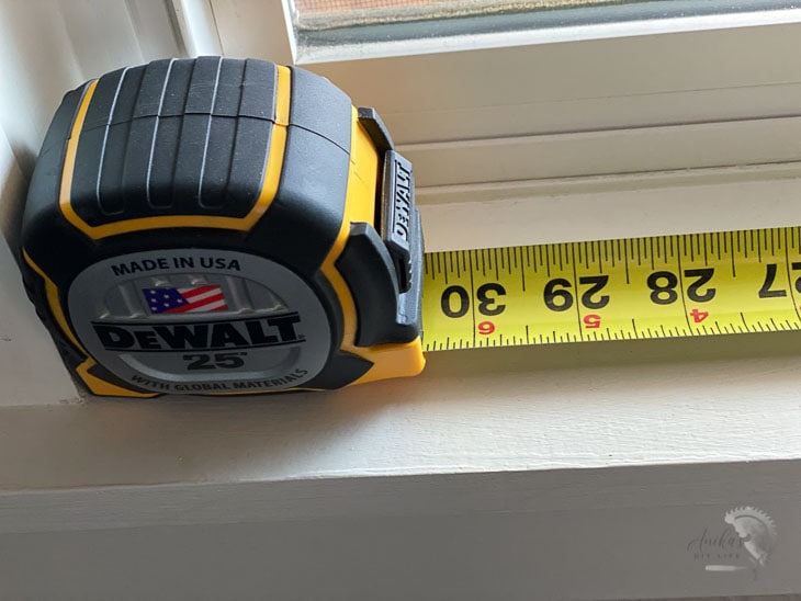 measuring a window using number on tape measure case